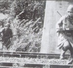 Une photo de la traversée de la voie ferrée de Dornot.