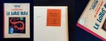 Édition avec pages de garde bleues montées en 1937 : référencée par Louis Casterman comme l’édition originale aboutie dans sa bibliothèque. À noter le tampon « Bureau M. Louis », et le nombre de pages écrit au stylo sur le plat par Charles Lesne, tous deux d’époque. Le n° A112, fut apposé par Gérard Casterman, patron de l’imprimerie, fin des années 1940 lorsqu’il constitua les archives. L’étiquette bibliothèque Casterman à l’intérieur du livre est postérieure (années 1950).